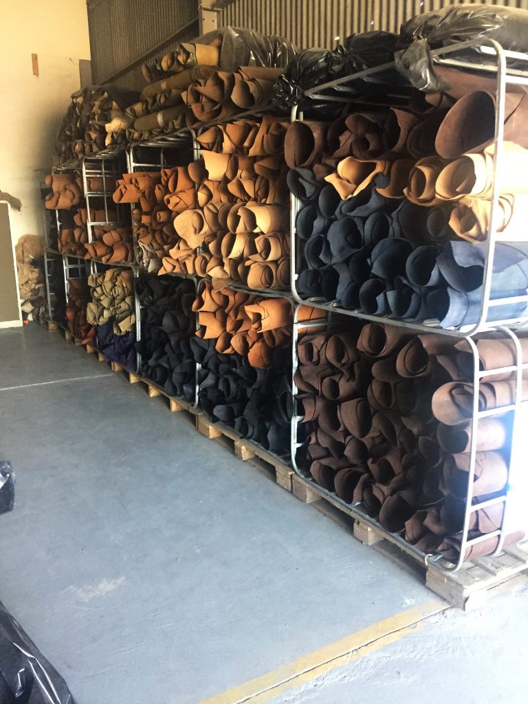 Leather materials stored and bundled in a workshop